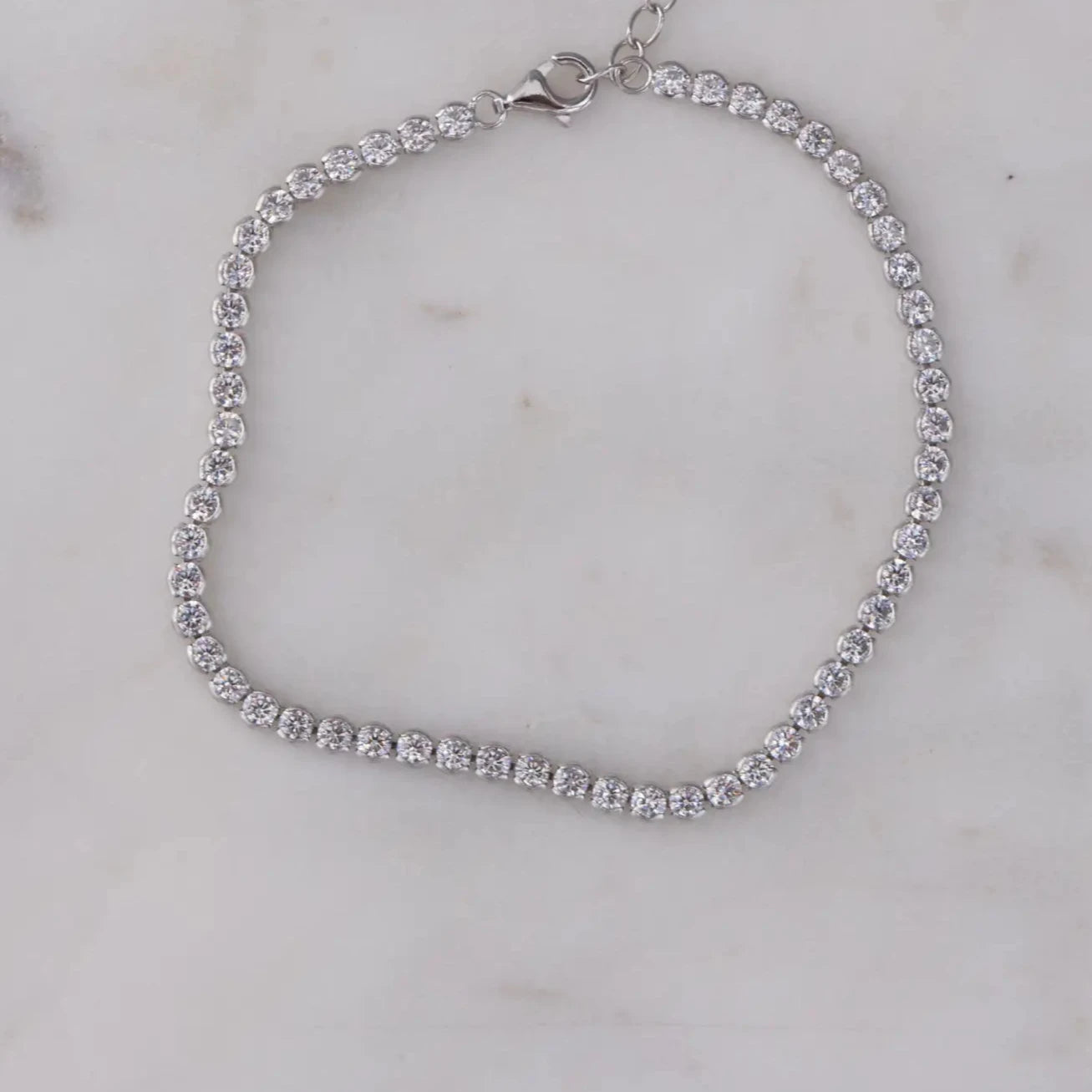 LOTUS ROUND TENNIS BRACELET