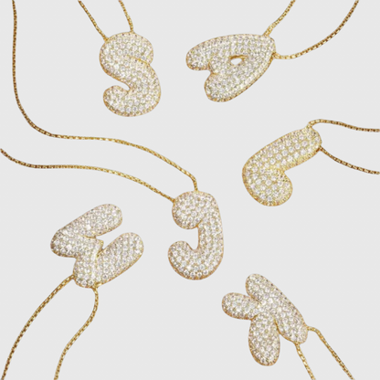 THE WAVY INITIAL NECKLACE